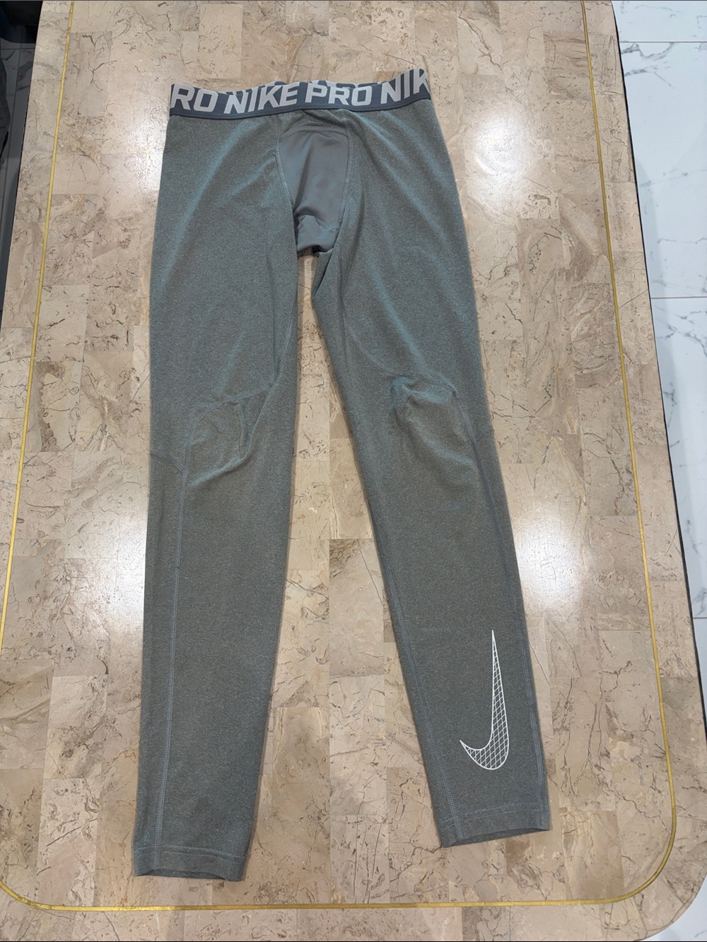 Nike Gray Youth Pro Performance Leggings with White Swoosh